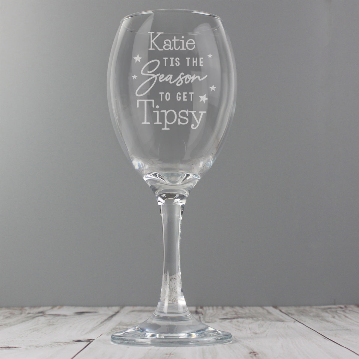 Personalised 'Tis The Season To Get Tipsy Wine Glass with personalised text, view 3