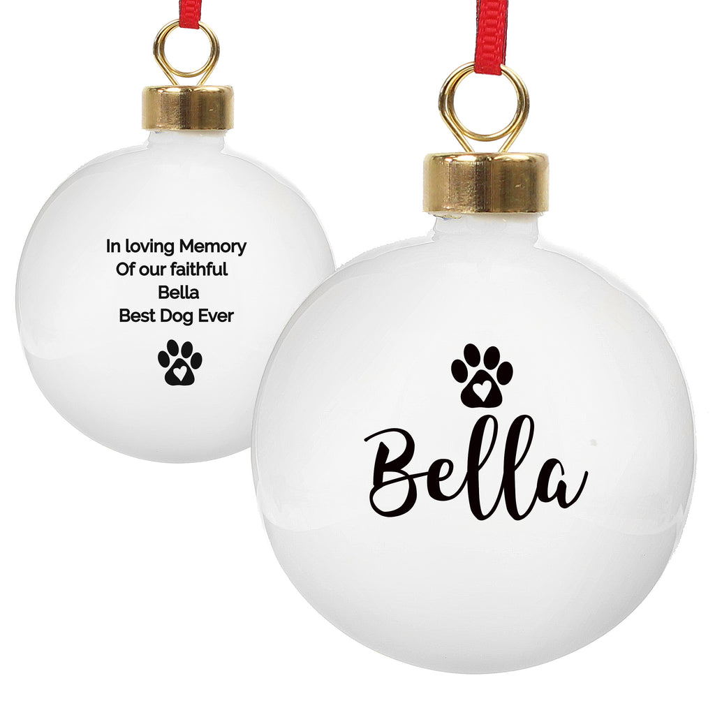 Personalised pet paw print ceramic Christmas bauble hanging on the tree