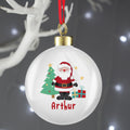 Personalised Santa and Presents Bauble hanging on a Christmas tree