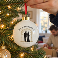 Personalised Mr & Mrs Bride and Groom Ceramic Bauble hanging on a Christmas tree
