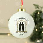 Personalised Mr & Mr ceramic Christmas bauble hanging on the tree