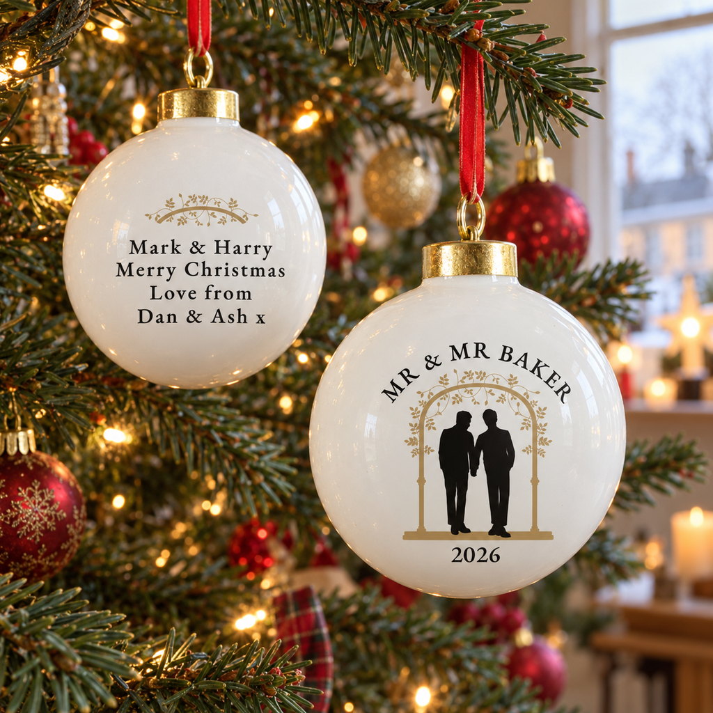 Personalised Mr & Mr ceramic Christmas bauble, front and back, hanging on the tree