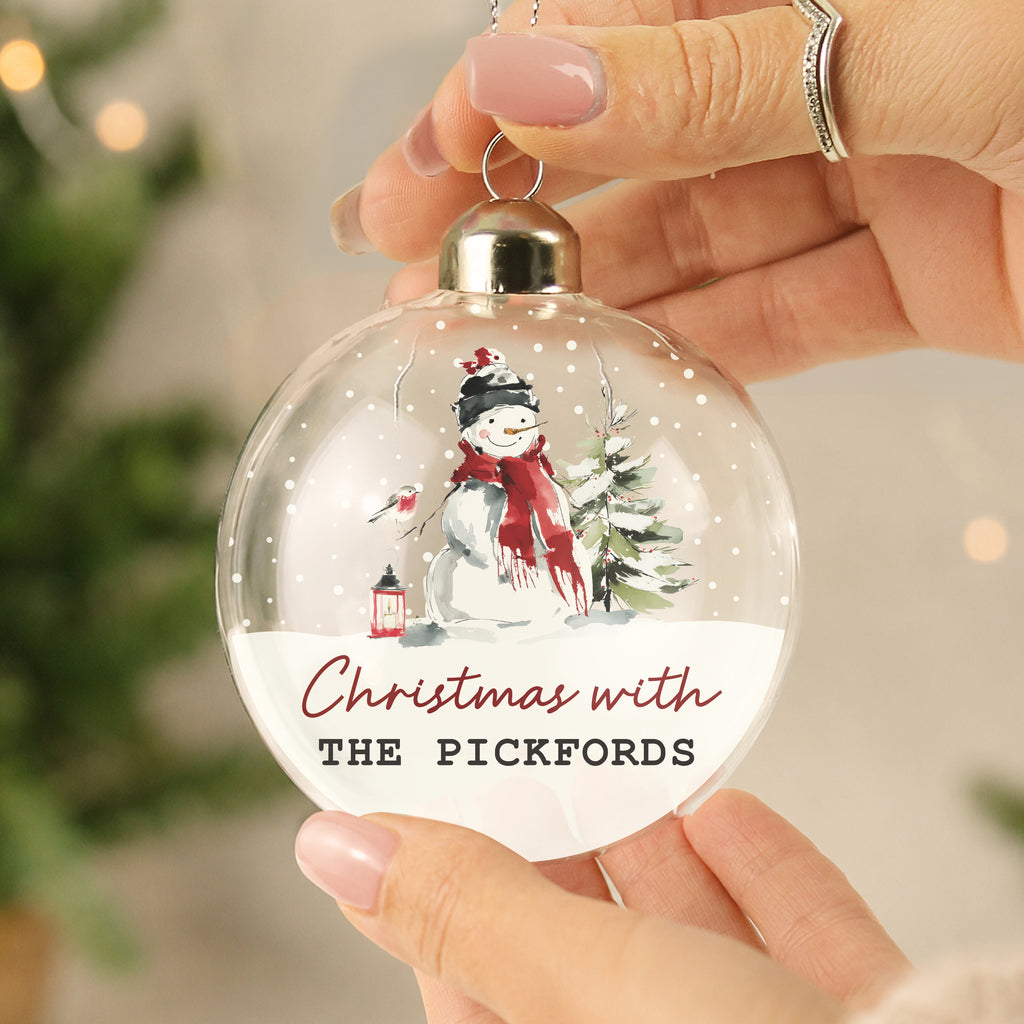 Personalised Traditional Snowman Glass Bauble hanging on a Christmas tree