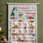 Personalised The Snowman Christmas Wishes Advent Calendar hanging on the wall at Christmas
