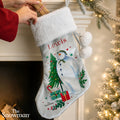 Personalised The Snowman Christmas Wishes Stocking hanging by the fireplace