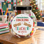 Personalised Cracking Teacher Christmas sweet jar on a classroom desk