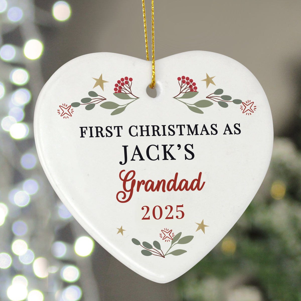 Personalised First Christmas as Grandparents ceramic heart hanging on a Christmas tree