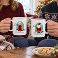 Couple holding the Personalised Mr & Mrs Claus Christmas Mug Set by the tree
