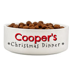 Personalised Christmas Dinner ceramic pet bowl filled with food on the kitchen floor