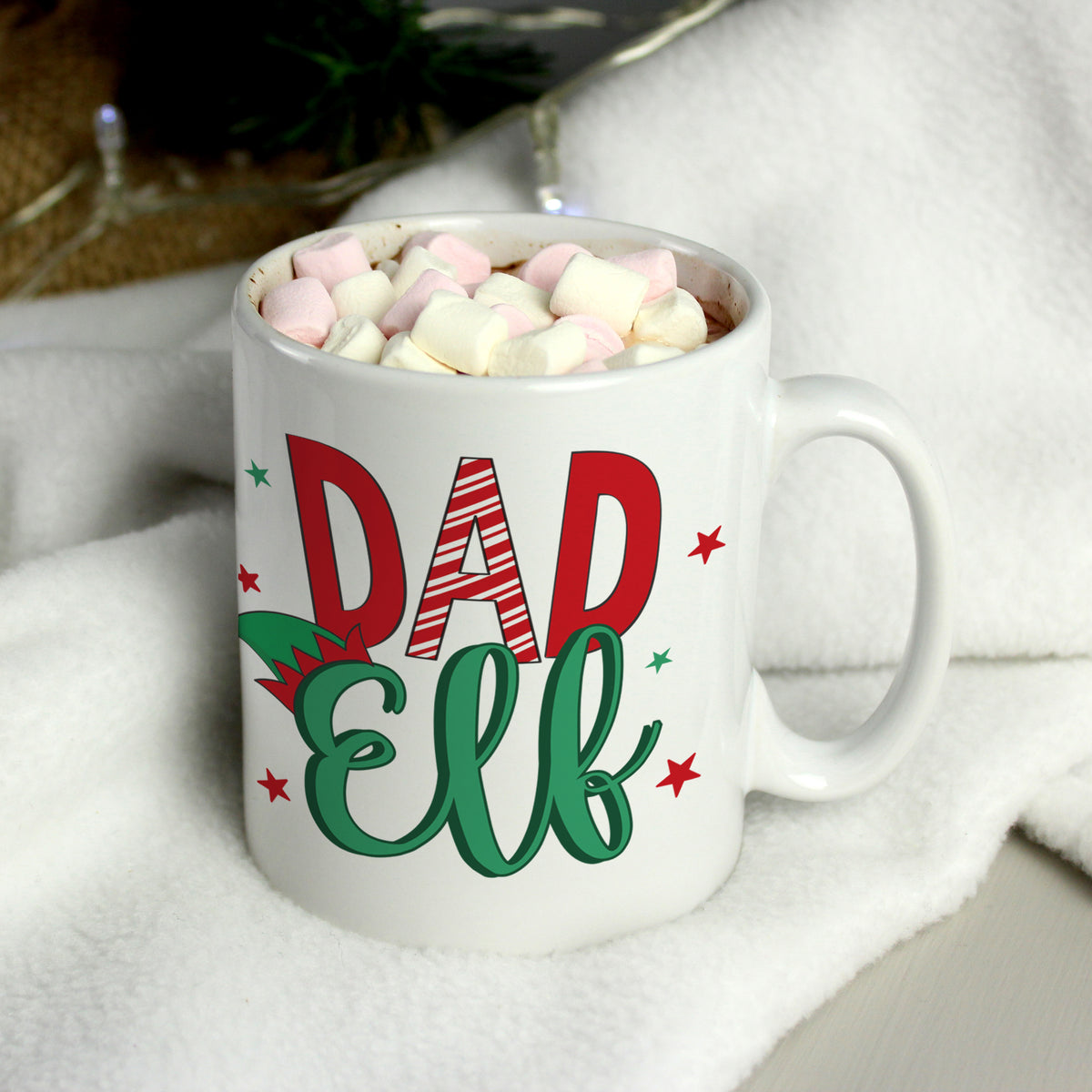 Personalised Dad Elf Christmas mug with a message on the back