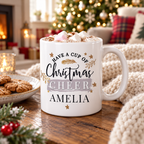 Personalised Cup of Christmas Cheer mug topped with hot chocolate and marshmallows