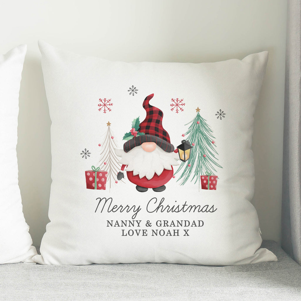 Personalised Gonk Merry Christmas Cushion on a sofa
