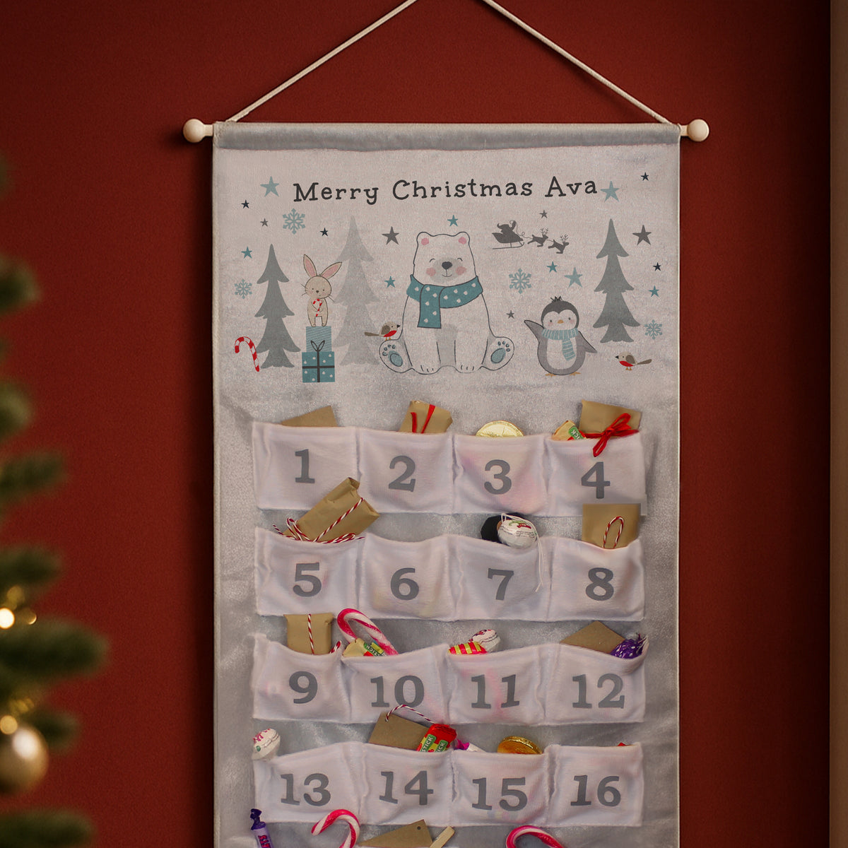 Personalised Polar Bear Advent Calendar hanging on the wall at Christmas