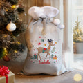 Personalised Reindeer Christmas Sack beside the Christmas tree