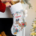 Personalised Reindeer Special Delivery Christmas Stocking hanging by the fireplace