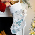 Personalised Polar Bear Christmas Stocking hanging by the fireplace