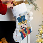 Personalised Nutcracker Christmas Stocking hanging by the fireplace