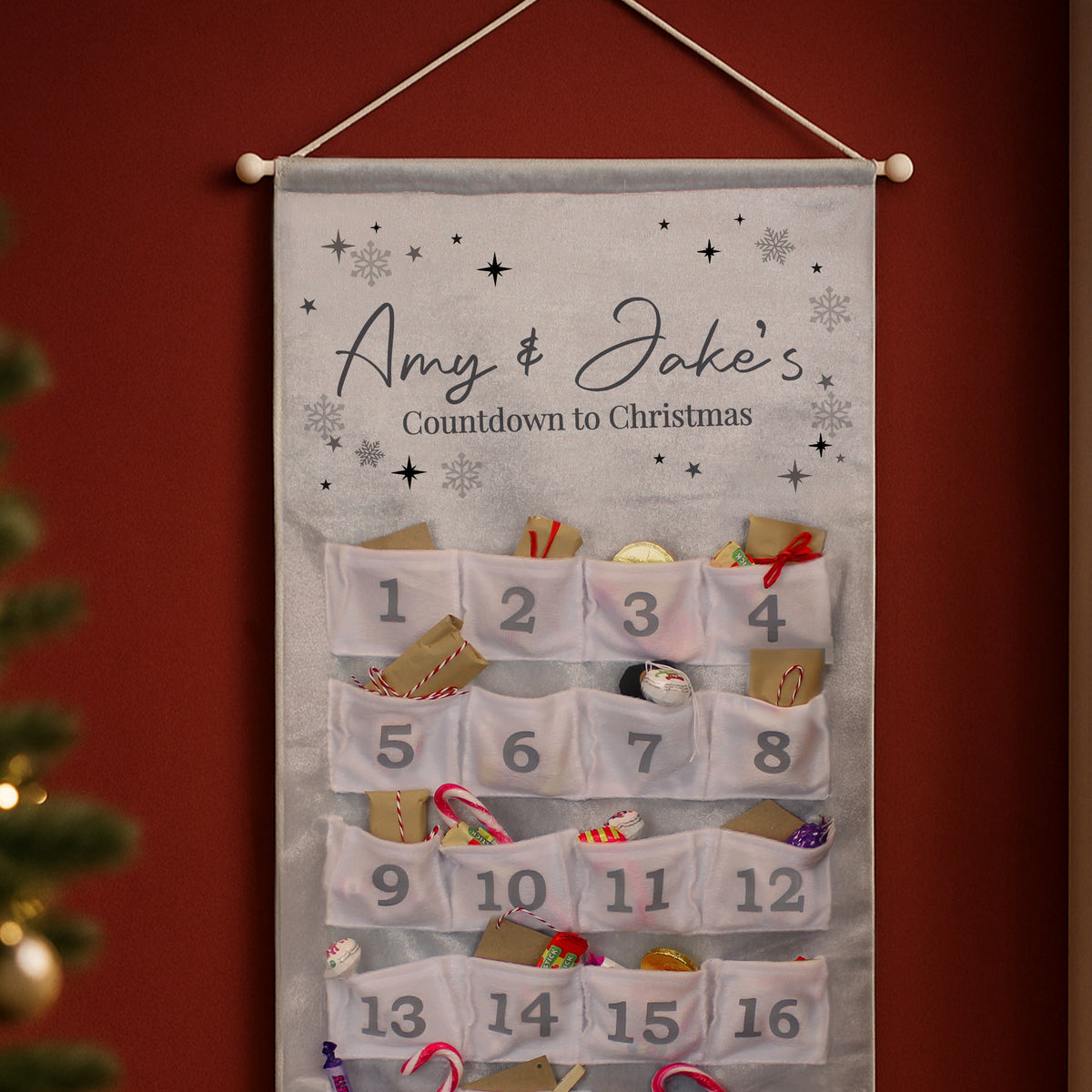 Personalised Family Advent Calendar hanging on the wall at Christmas