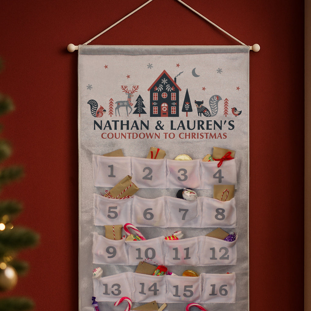 Personalised Christmas Home Advent Calendar hanging on the wall at Christmas