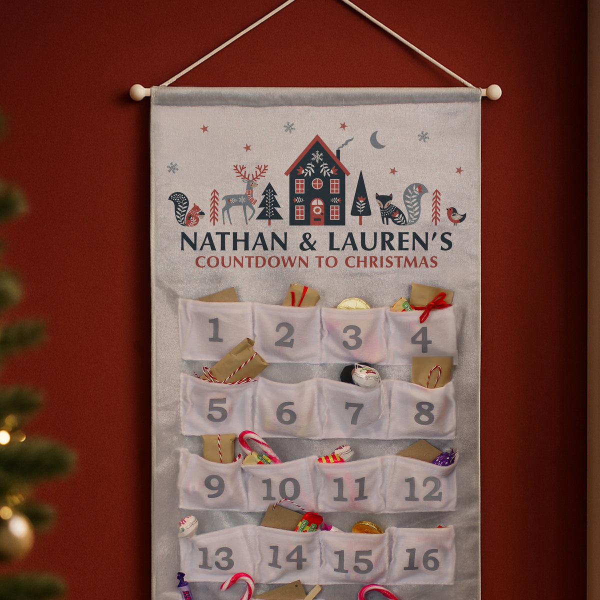 Personalised Christmas Home Advent Calendar hanging on the wall at Christmas