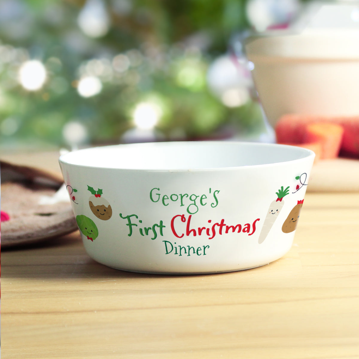 Personalised First Christmas Dinner bowl on a kitchen table at Christmas
