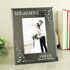 Personalised Mr & Mrs diamante glass photo frame holding a wedding photo