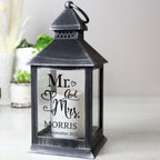 Personalised Mr & Mrs rustic black LED lantern on a shelf