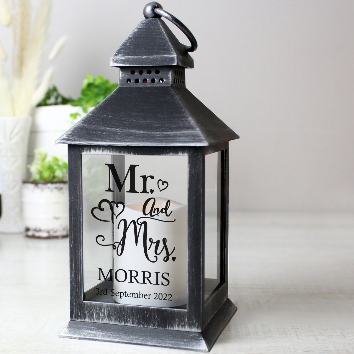 Personalised Mr & Mrs rustic black LED lantern on a shelf