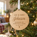 Personalised Mr & Mrs Round Wooden Decoration hanging on a Christmas tree