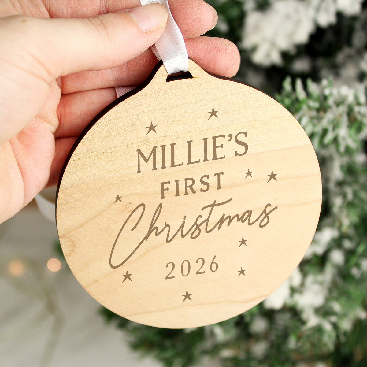 Personalised Baby's First Christmas Round Wooden Decoration with personalised text, view 3
