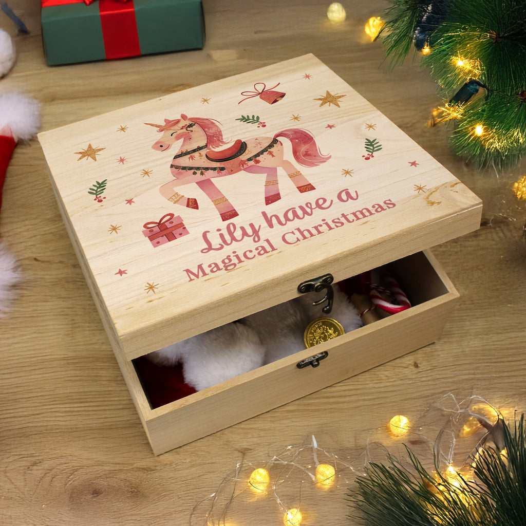 Personalised pink unicorn wooden Christmas Eve box under the Christmas tree