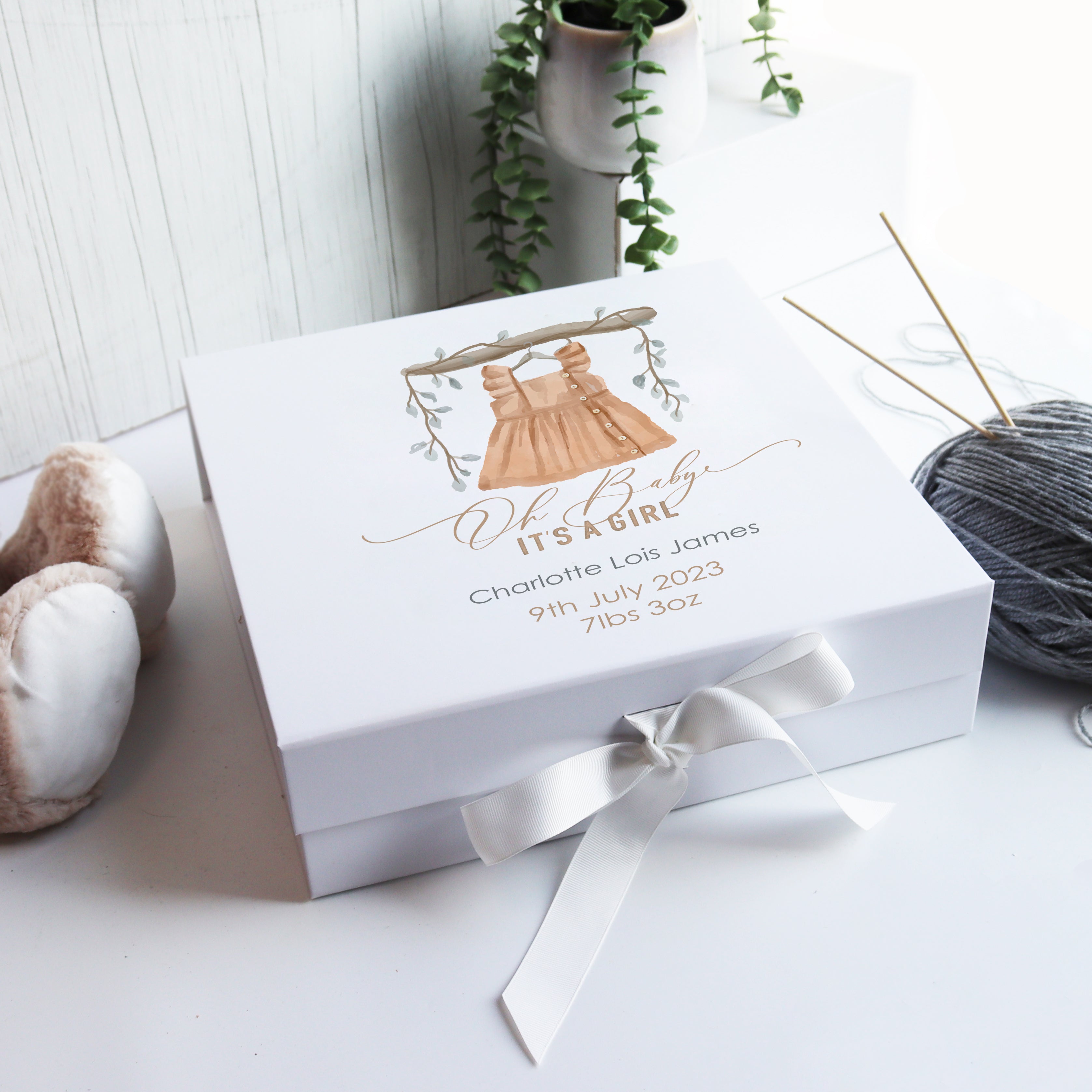 Luxury personalised baby memory box in white with hand-drawn illustration and elegant matte finish.