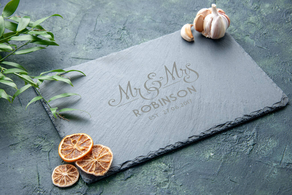 Personalised wedding slate serving board with Mr and Mrs engraving, perfect for cheese and sharing platters.