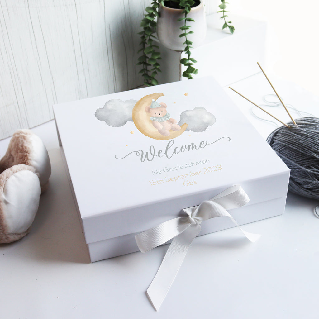 Luxury personalised baby memory box in white with hand-drawn watercolour balloon illustration and ribbon closure, ideal for newborn and baby shower gifts