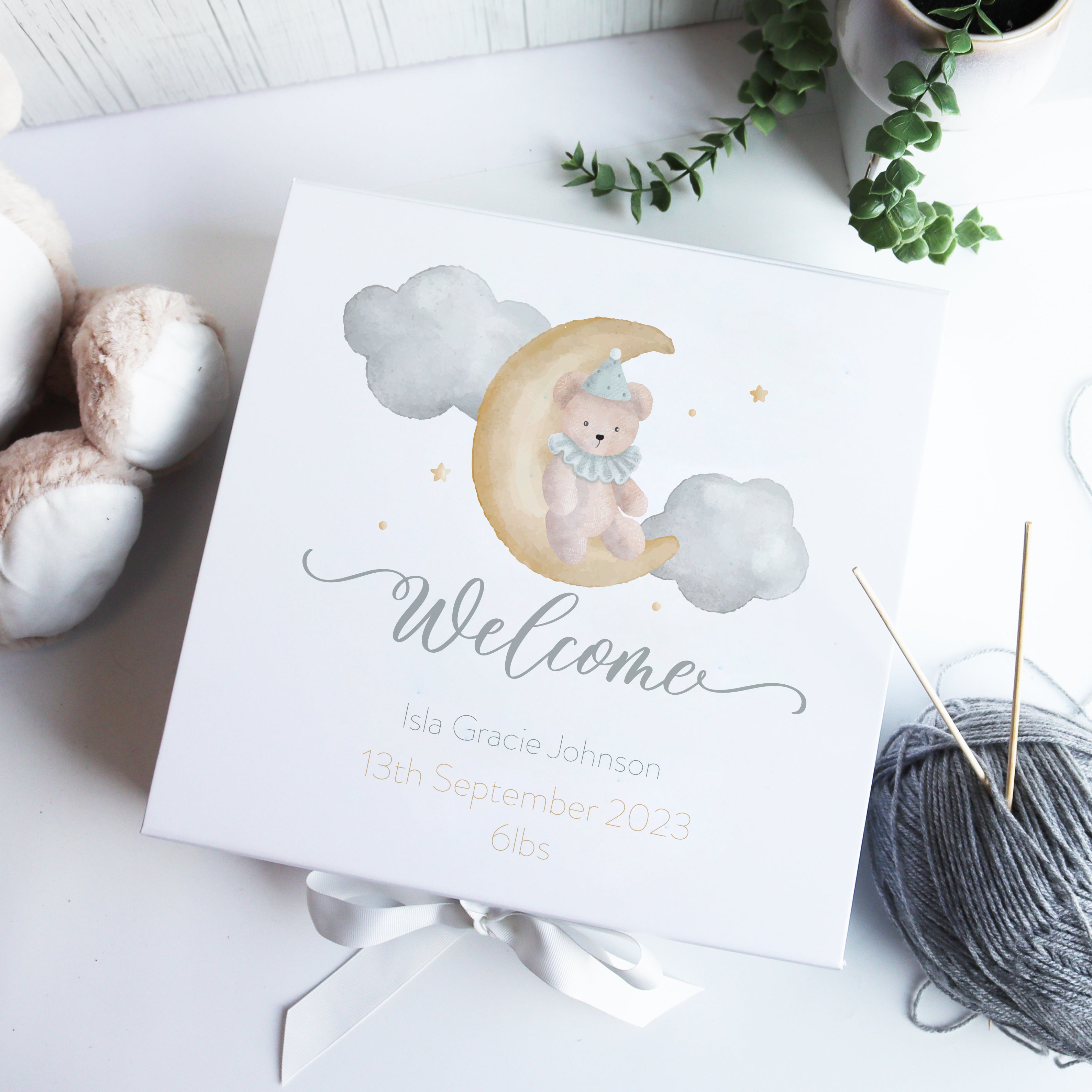 Personalised white luxury baby gift box with watercolour balloon design, customised with baby’s name and birth details, perfect as a new baby keepsake.