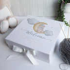 Personalised luxury baby memory box with matte white finish and ribbon, designed as a keepsake for a newborn baby