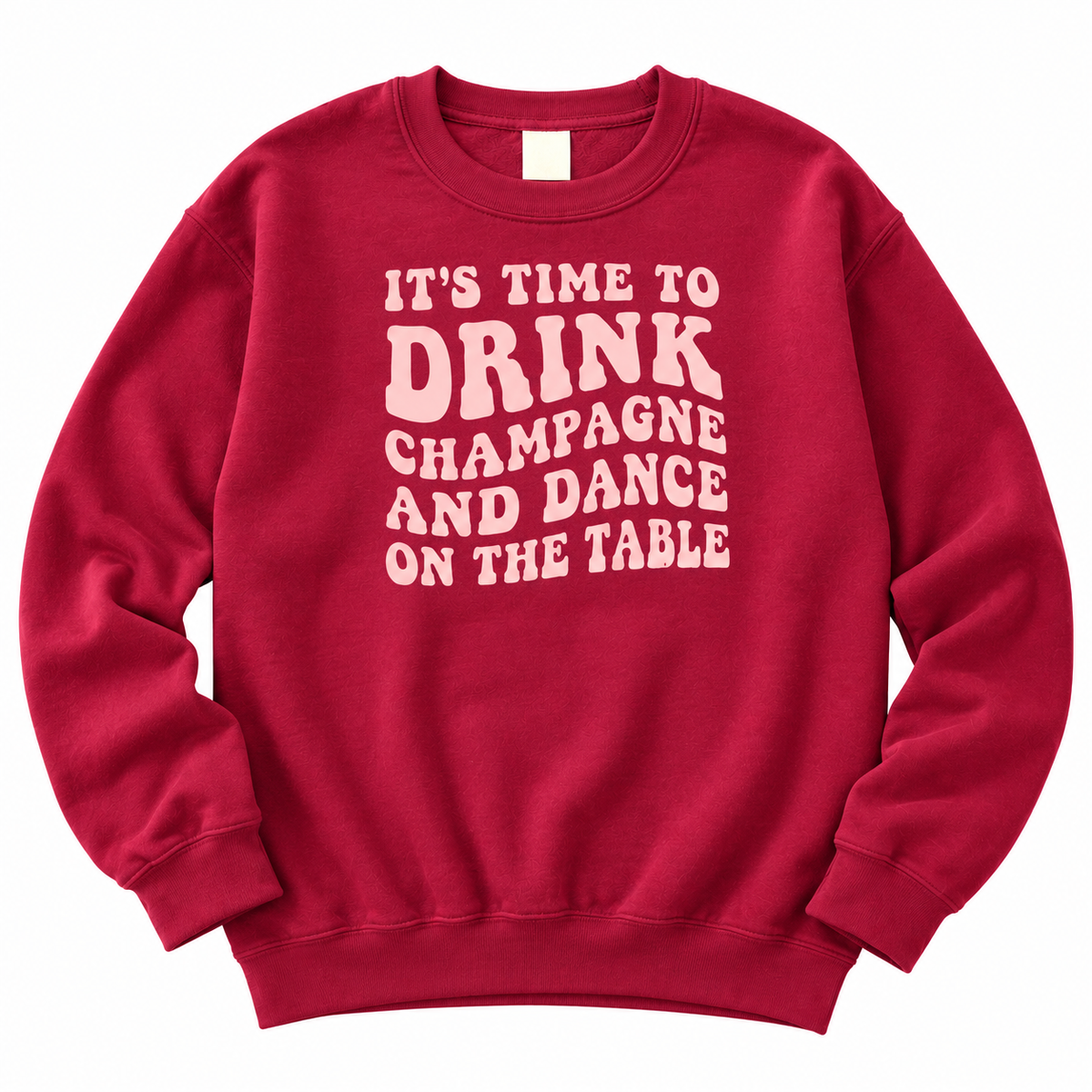 Burgundy champagne and dance slogan sweatshirt on a model against a plain white background, full product shot with sequin trousers.