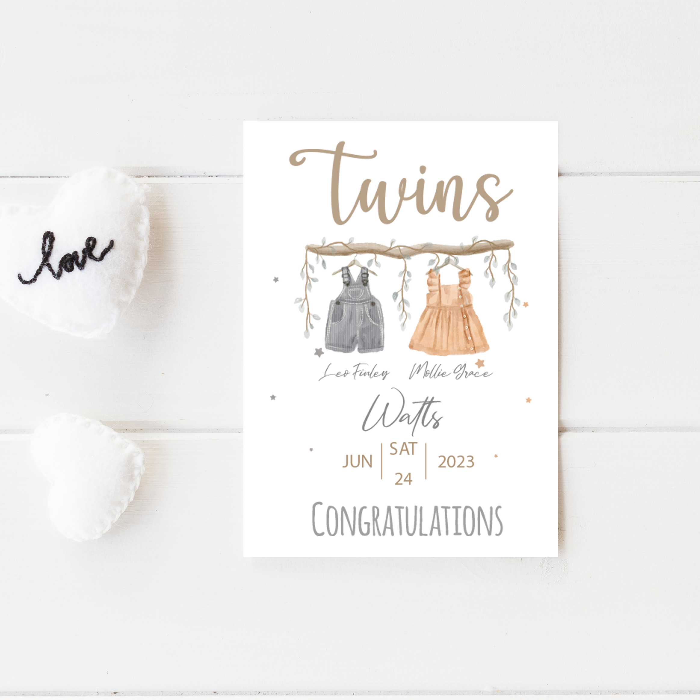 Personalised twins baby card with hand-drawn illustration, custom names, and birth dates.