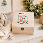 Personalised baby's first Christmas Eve box in wood with colourful name design