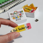 Custom teacher appreciation gift with mini matchbox and Best Teacher Ever badge.