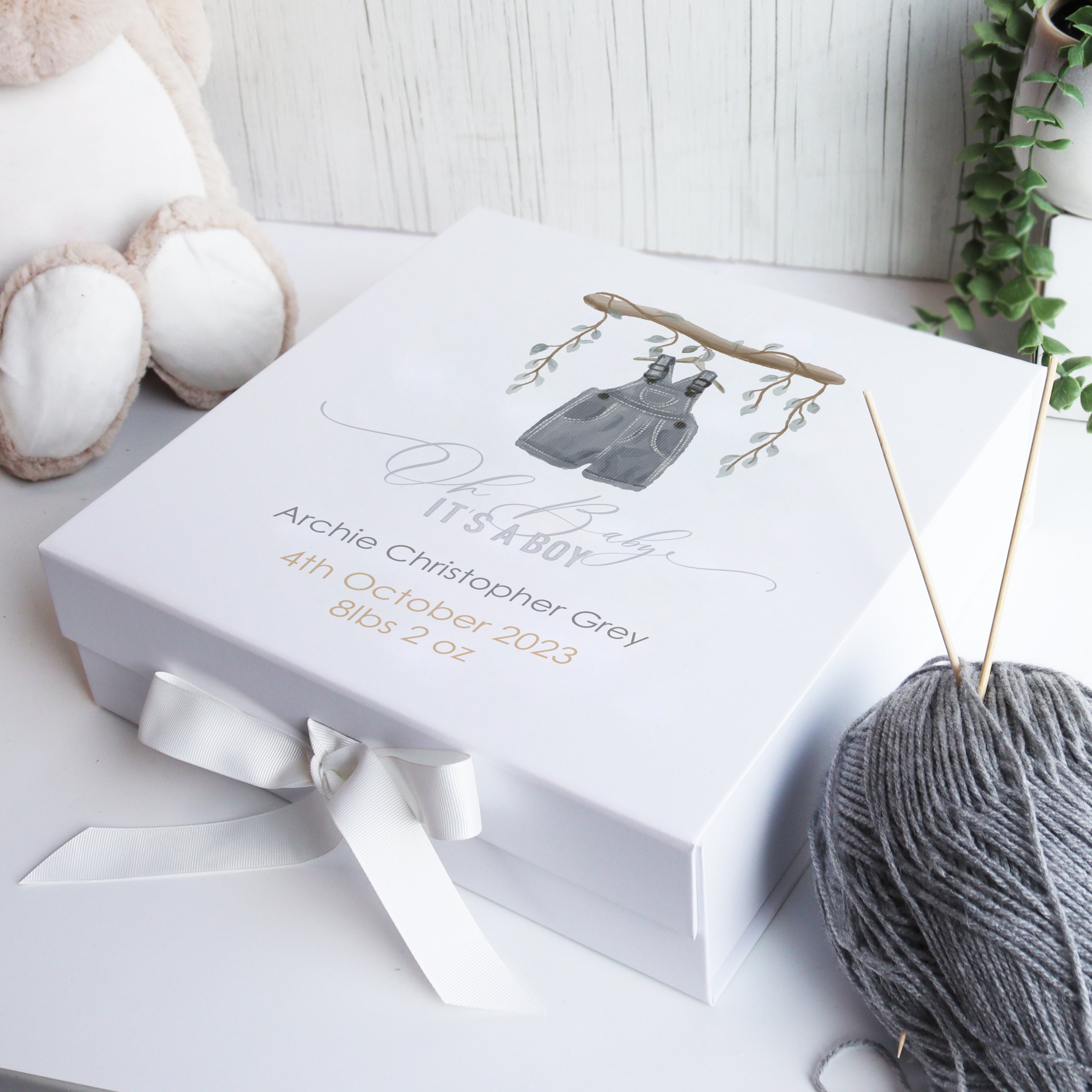 Hand finished luxury baby gift box with personalised name and birth details, designed for treasured keepsakes.