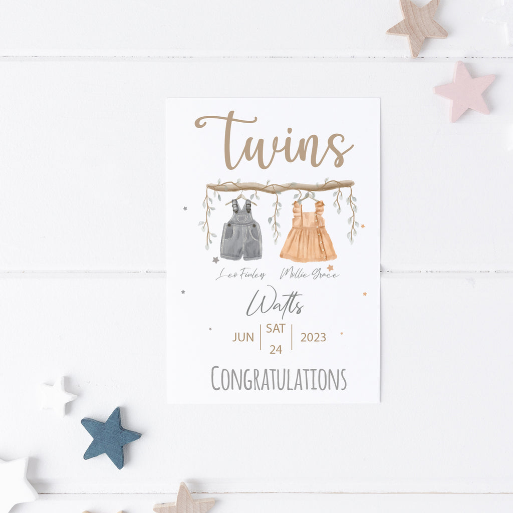 Hand-crafted personalised baby card featuring whimsical twin illustration.