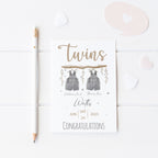 Unique newborn twins greeting card, perfect for baby showers and new parent gifts.