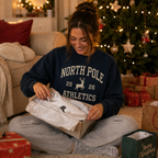Personalised North Pole Athletics Christmas Jumper, Navy Varsity Print