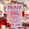 Valentine's card with sardine tin illustration and 'Packed With Love' wording