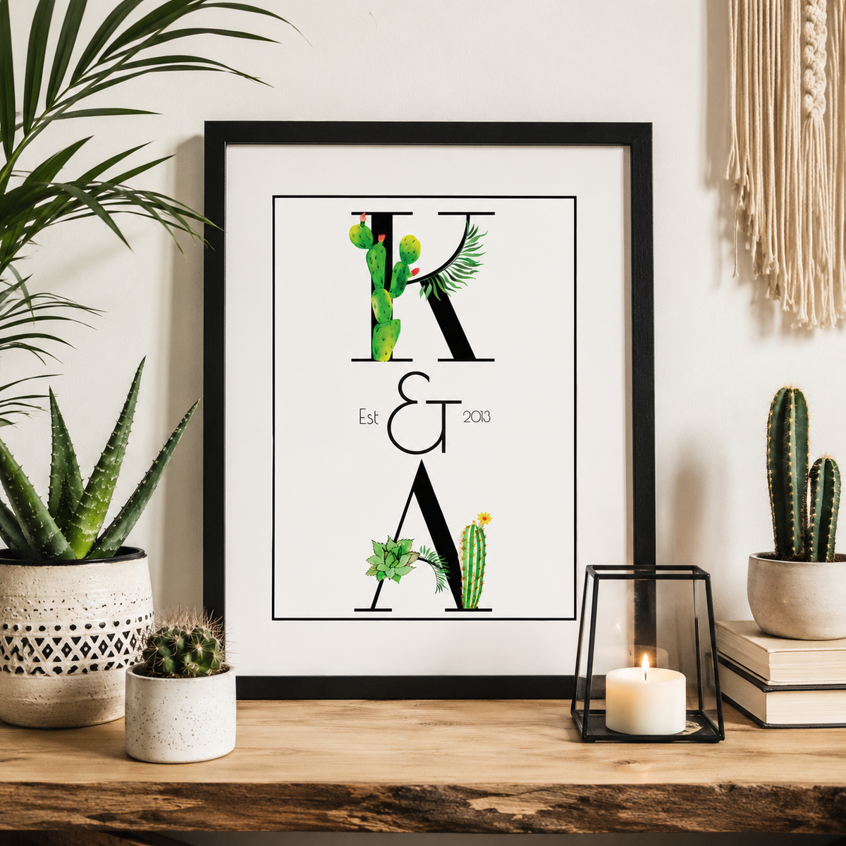 Personalised couples watercolour cactus print with initials 'K & A Est 2013' in a black frame