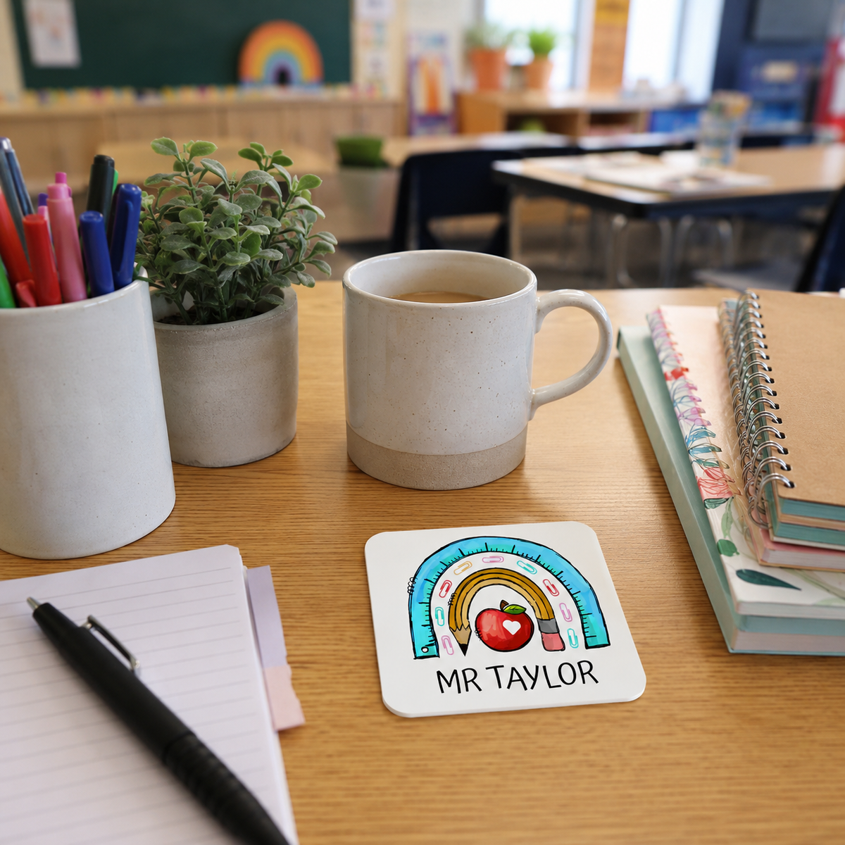 Personalised rainbow teacher coaster with apple and stationery design