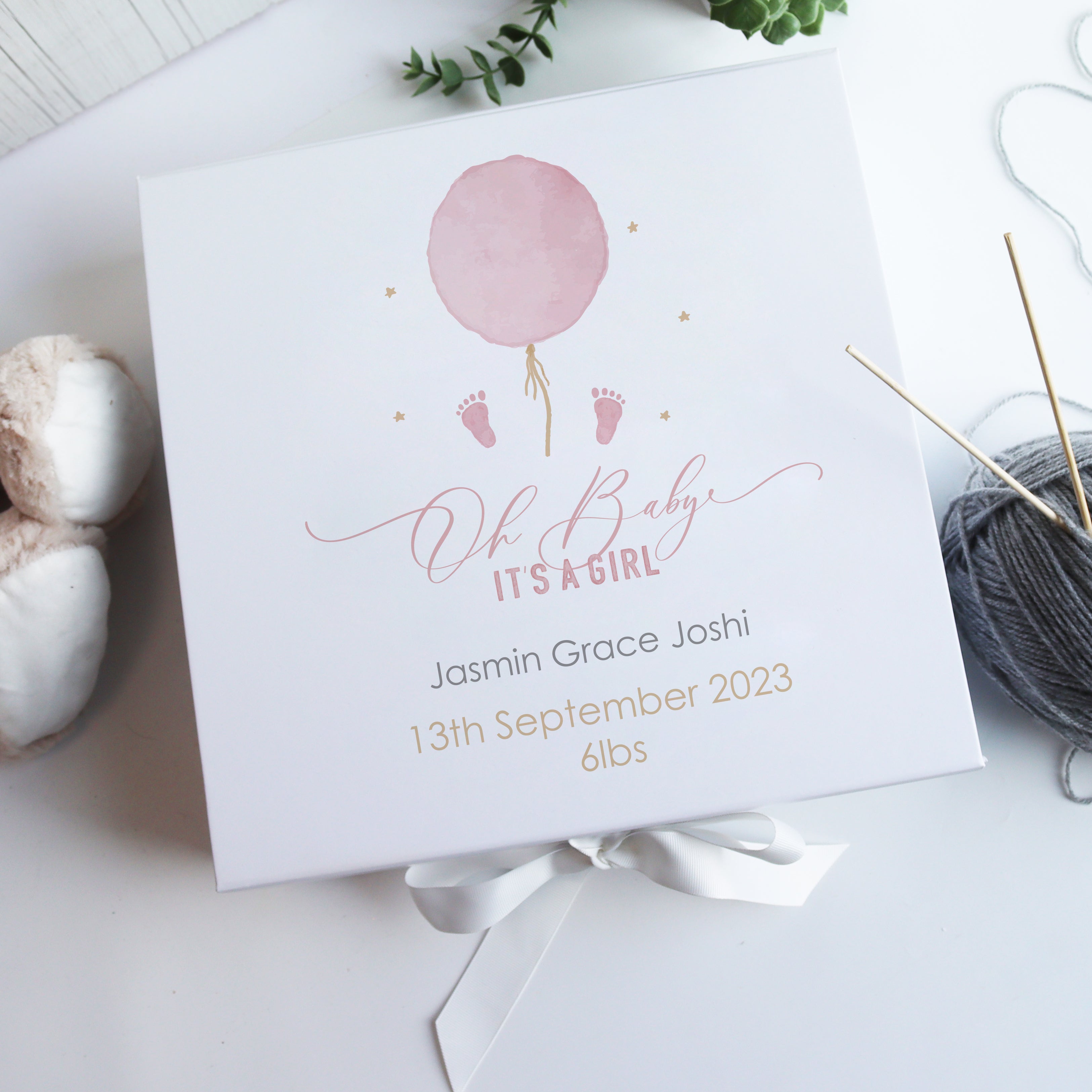 White luxury baby girl memory box with ribbon tie, handmade for storing baby keepsakes