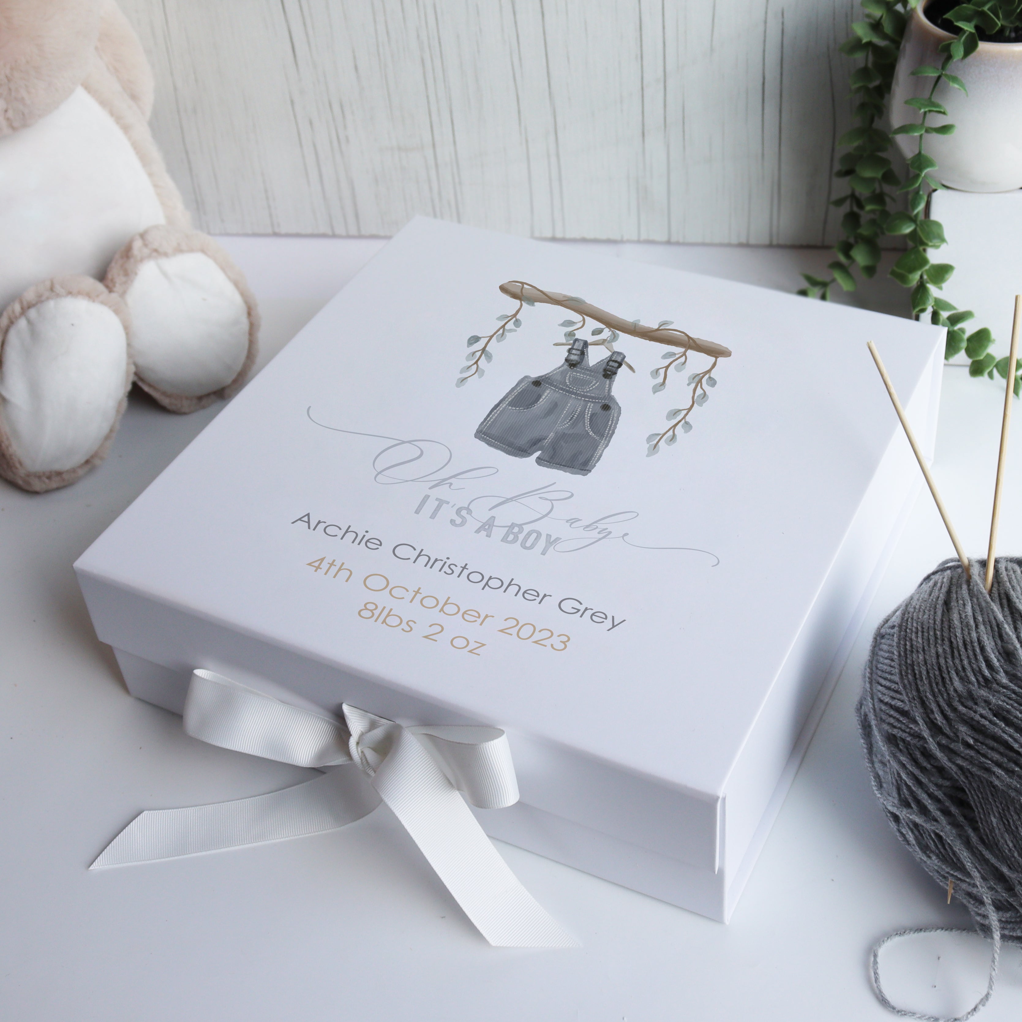 White luxury baby memory box with hand-drawn balloon illustration, designed as a personalised newborn keepsake gift.
