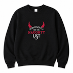 Black Permanently On The Naughty List Christmas jumper with red devil horns, on a plain white background.
